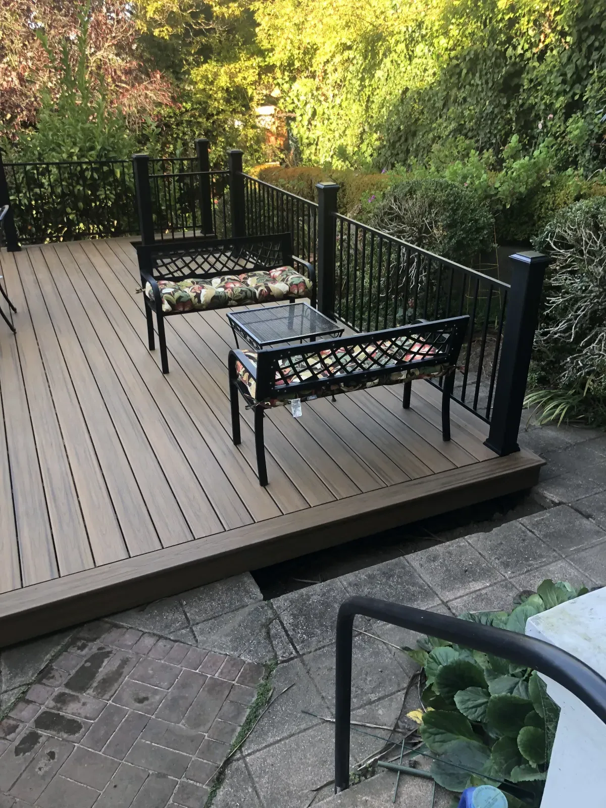 Custom composite deck with integrated planters and trellis in San Francisco