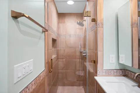 Traditional Bathroom Remodel with Custom Tile Detail — photo 8