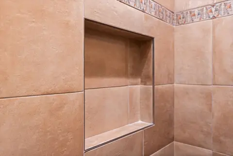 Traditional Bathroom Remodel with Custom Tile Detail — photo 12