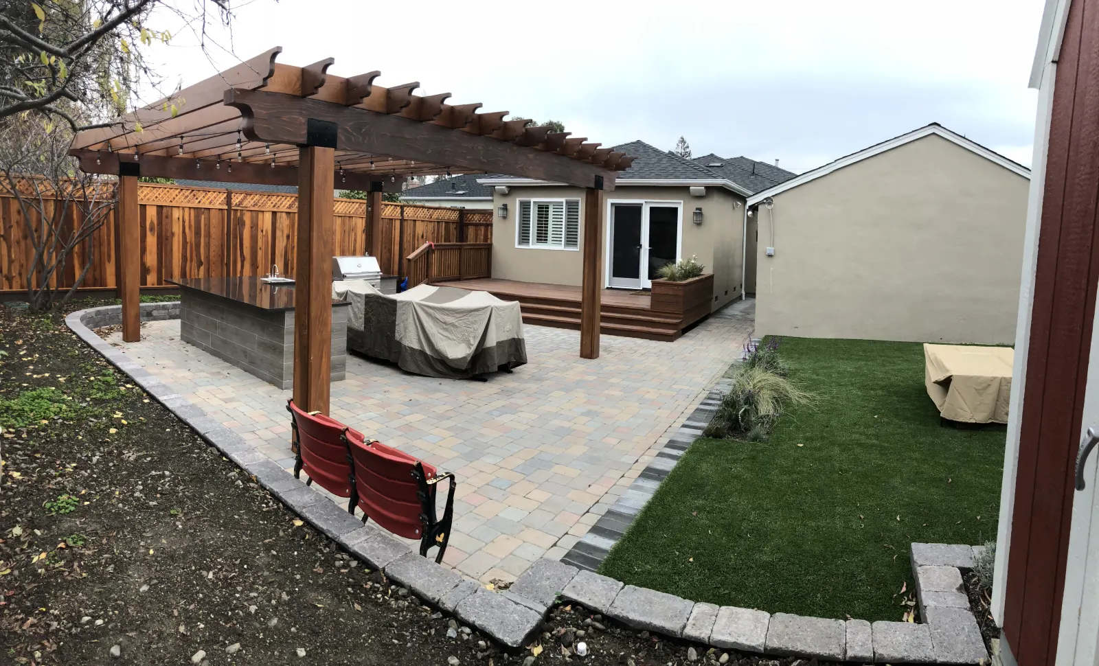 Custom cedar pergola over outdoor kitchen in San Mateo